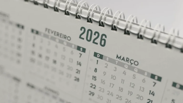 A desk calendar open at the year 2026
